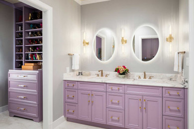 Large traditional master bathroom in Dallas with recessed-panel cabinets, purple cabinets, an alcove shower, a two-piece toilet, white tile, porcelain tile, grey walls, porcelain floors, an undermount sink, quartzite benchtops, white floor, a hinged shower door, white benchtops, a shower seat, a double vanity and a built-in vanity.