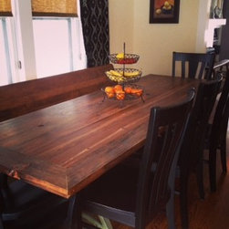 Reclaimed wood (late 1800s grocery store) table with antique lathe machine legs - Products