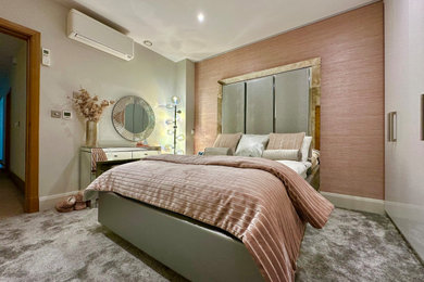 Photo of a contemporary bedroom in Cheshire.