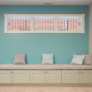 Medium sized contemporary look-out basement in Chicago with beige walls, carpet and a ribbon fireplace.