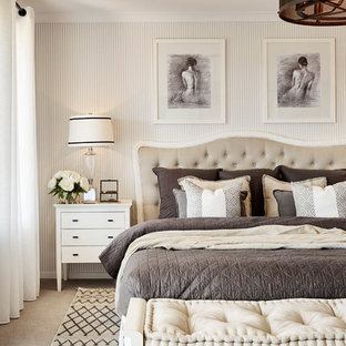 Imagen de dormitorio principal, tradicional, con paredes beige y moqueta