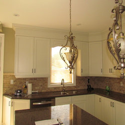 Hunter Douglas roller shade over the kitchen sink, Burlington, Ontario - Roller Shades