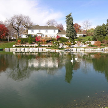 Historic Farmhouse Bank and Pond Landscape