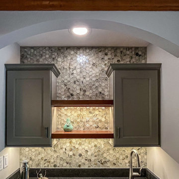 Wet Bar with Undercounter Beverage Center with Leathered Granite Countertop