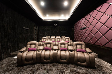Example of a trendy home theater design in Houston