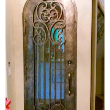 Custom Iron Wine Cellar Door Texas Builders