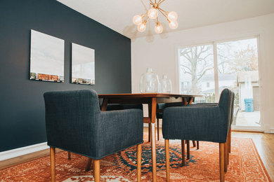 Example of a 1950s dining room design in Other