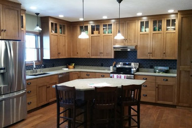 Example of a classic kitchen design in Other