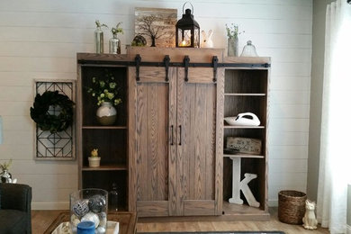 Example of a country family room design in Other
