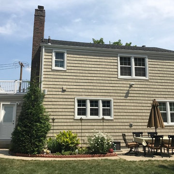 Garden City Siding - Vintage Wicker Shakes with Plum Creek Tight Cut Stone