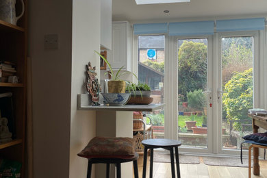 A light filled, contemporary kitchen and living space reconfiguration