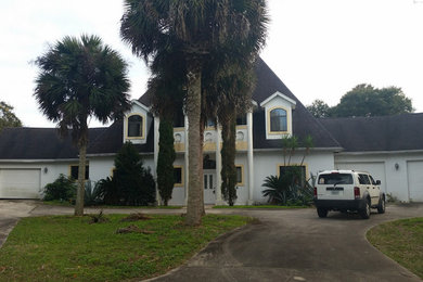 Huge trendy home design photo in Orlando