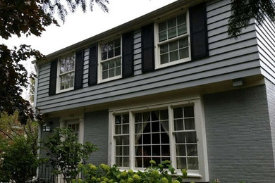 Elegant gray two-story mixed siding house exterior photo in San Diego
