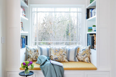 Family room library - large transitional open concept family room library idea in Seattle with white walls, no fireplace and no tv