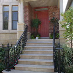 Solid stone stairs with ornamental iron railing - Products