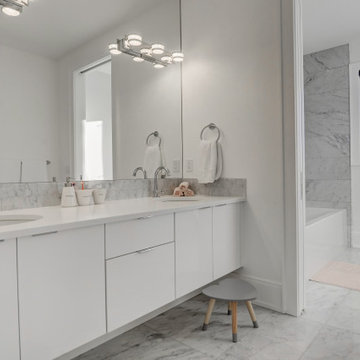 A modern bathroom with floating vanity