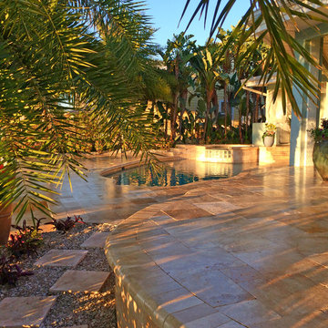 Backyard transformation features a new Travertine deck