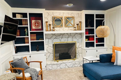 Family room library - mid-sized traditional family room library idea in Atlanta with a wall-mounted tv
