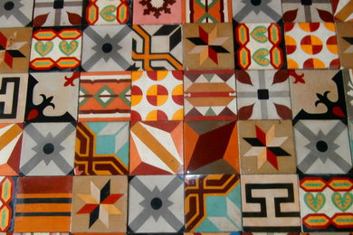 Patchwork rug made from old patterned tiles