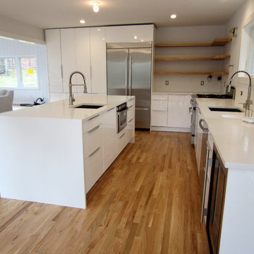 EAST HAMPTON 2 1/4" RED OAK INSTALLED & FINISHED W BONA AMBERSEAL AND TRAFFIC HD