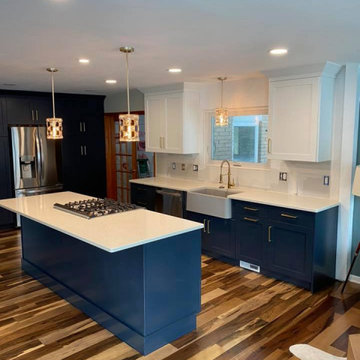 Cabinets: Showplace EVO Door Style Pierce Extra White Uppers, Hail Navy Lowers &