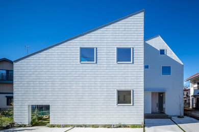 Farmhouse white exterior home photo in Other