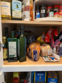 Fixed the too deep pantry shelf issue. Just cut the shelves in a U. So much  better!