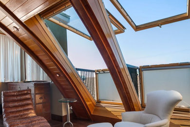 Inspiration for a small craftsman master medium tone wood floor and brown floor bedroom remodel in San Diego with beige walls