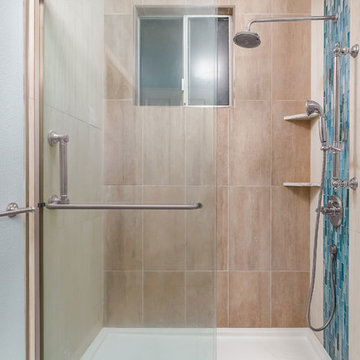 Contemporary Bathroom Remodel With Unique Blue Tile Accents