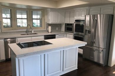 Example of a classic kitchen design in Other