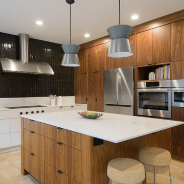 Walnut Accent Cabinetry in Black and White Kitchen