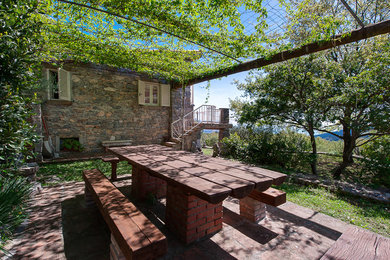 Inspiration for a cottage deck remodel in Other