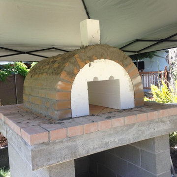 The Castillo Family Wood Fired Pizza Oven & La Caja Style Pig Roaster in WA