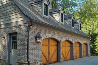 Mountain style four-car garage photo in Atlanta