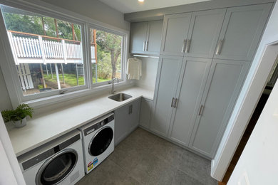Inspiration for a modern laundry room in Brisbane.