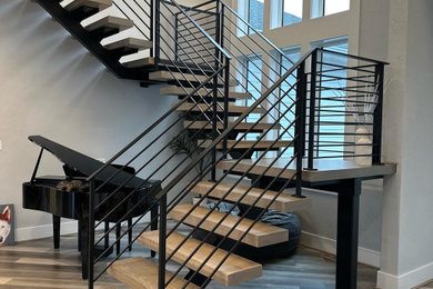 Staircase - contemporary staircase idea in Other