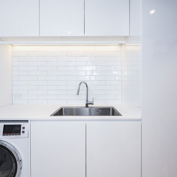 Laundry room with White Benchtops