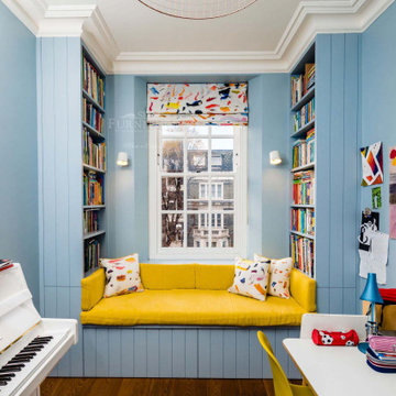 Kids Study Room with Window Seating and Bookcases