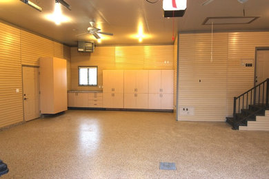 Inspiration for a contemporary attached garage remodel in Other
