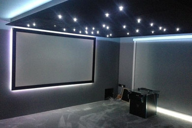 Photo of a contemporary home cinema in Other.