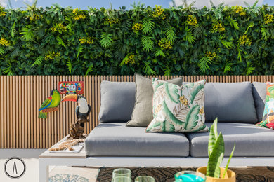 Photo of a tropical home design in Perth.