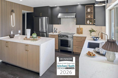 Mid-sized trendy l-shaped vinyl floor and gray floor eat-in kitchen photo in San Diego with an undermount sink, flat-panel cabinets, black cabinets, quartzite countertops, white backsplash, stone slab backsplash, stainless steel appliances, a peninsula and white countertops