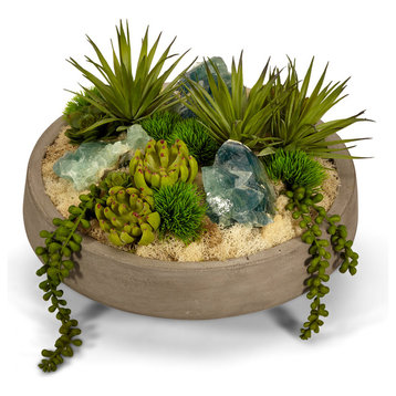 succulents and flourite in concrete bowl