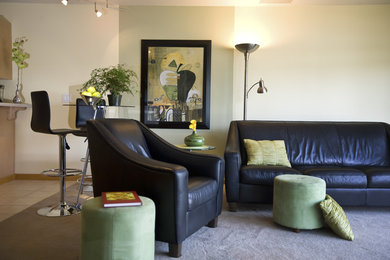 Inspiration for a mid-sized contemporary formal open concept living room in Portland with beige walls, carpet and no tv.