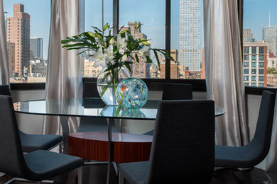 Example of a trendy dining room design in New York