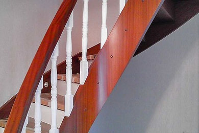 Inspiration for a mid-sized 1950s staircase remodel in Other