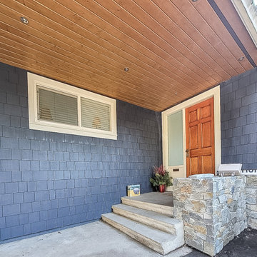 JH Shingles Cedarmill in DEEP OCEAN + 1X6 Pine soffit. WOODTONE. Honey brown