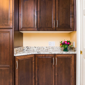 Transitional Style Laundry/Mudroom With Medium Stained Maple Cabinets