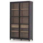 Four Hands - Millie Cabinet-Drifted Black/Drifted Oak - Two-tone transparency. Black drifted oak frames lighter interior shelving for subtle but striking contrast. Glass doors allow for prized possessions to dazzle on full display while a spacious interior drawer adds an out-of-view storage option.