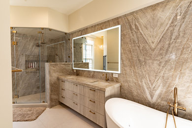 Large trendy master beige tile and stone slab beige floor and double-sink bathroom photo in San Diego with a bidet, beige walls, an undermount sink, quartzite countertops, a hinged shower door, beige countertops and a built-in vanity